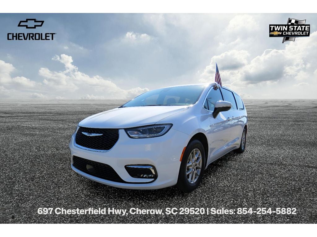 2023 Chrysler Pacifica Touring L in White — front three-quarter view
